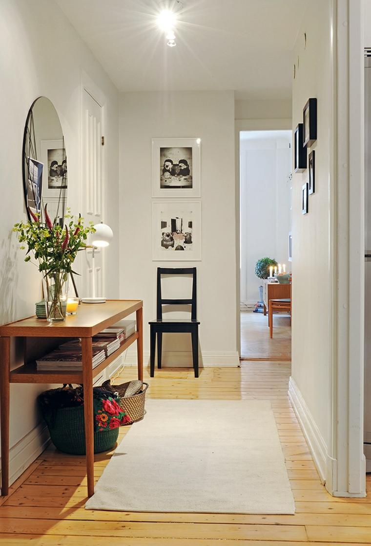 ingresso interno casa specchio interno arredamento fiori idee tappetini bianchi decorare immagini parete idea di design parquet legno