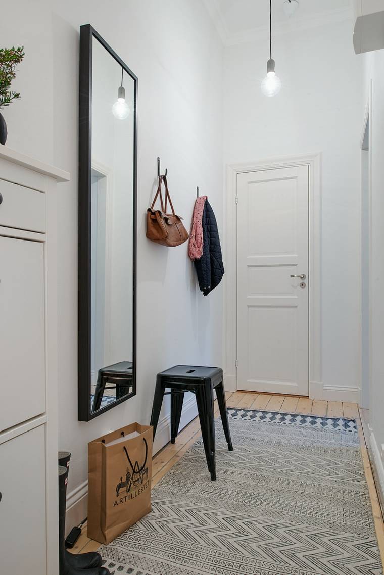 decorare il tuo ingresso idea di design minimalista specchio illuminazione sospensione design sgabello idea di design in metallo nero tappetino