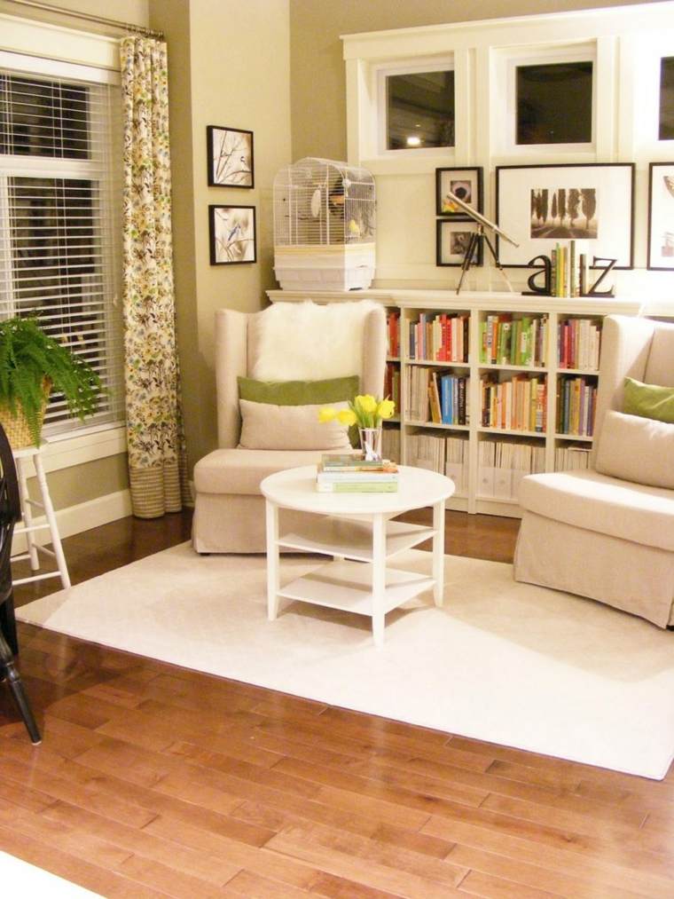 design libreria spazio soggiorno idea tavolino poltrona bianca