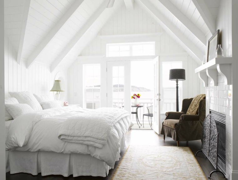 bianco arredamento camera da letto design testiera del letto cuscini poltrona marrone