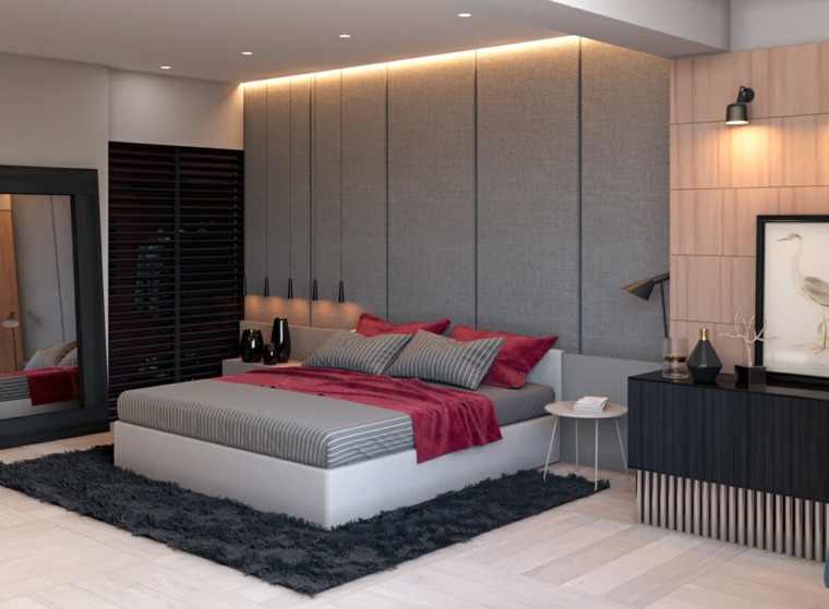 siva spavaća soba s tapiserijom i tepihom u sivim i ružičastim nijansama