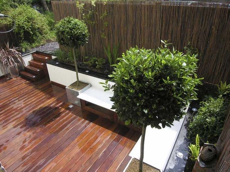 kaip įdėti medinės terasos idėją apie vazoninį augalą lauko puošmena