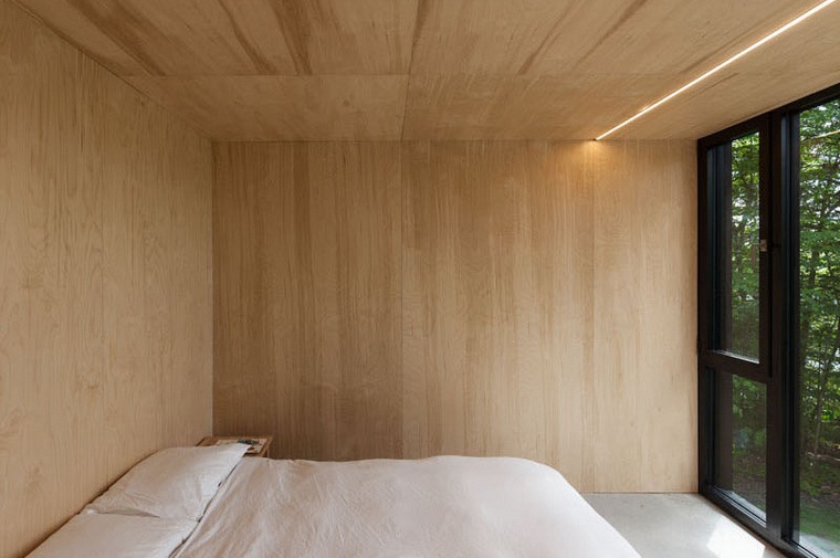 costruttore-casa-legno-DRAA-cabina-foresta-hemlock-quebec-canada-camera da letto