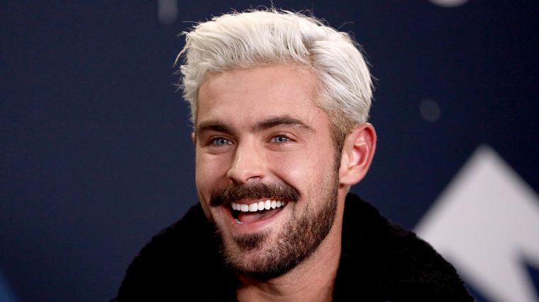 kietas Zac Efron blondinės kirpimas