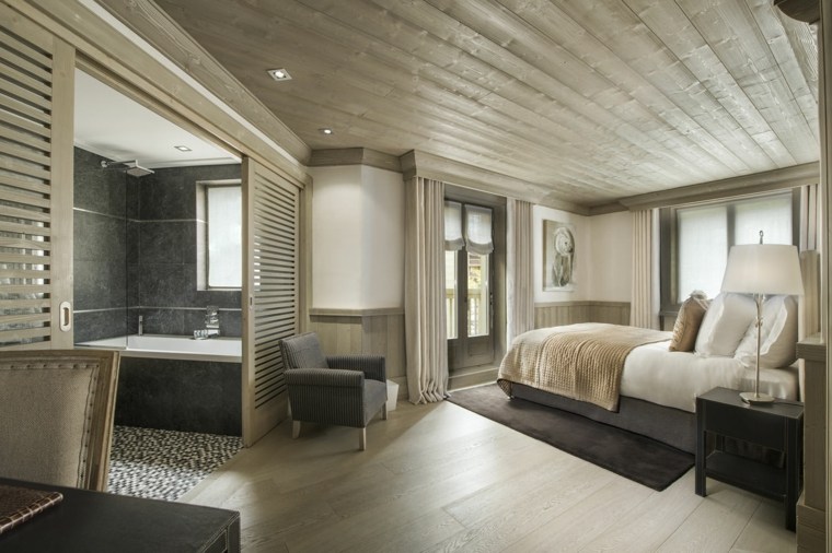 Idee per arredare uno chalet in camera da letto principale