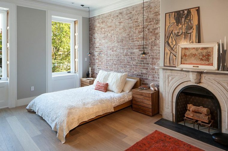 Camera da letto con pavimento in legno di mattoni di pietra deco