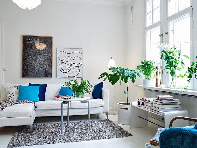 decorazione del soggiorno idea parete tavolo tappetino vaso per piante