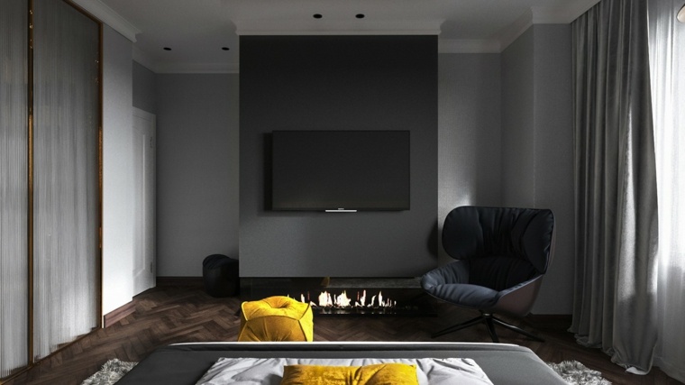 Ideja za kamin u spavaćoj sobi parket drvo fotelja televizija