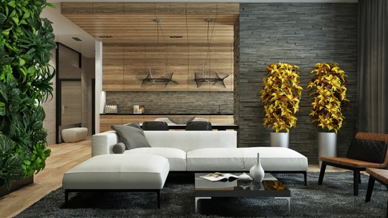 szürke fal dombormű nappali design fehér kanapé párnák tereprendezés szürke padlószőnyeg