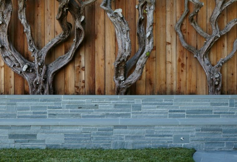 Recinzione in pietra da giardino in legno idea paesaggistica esterna