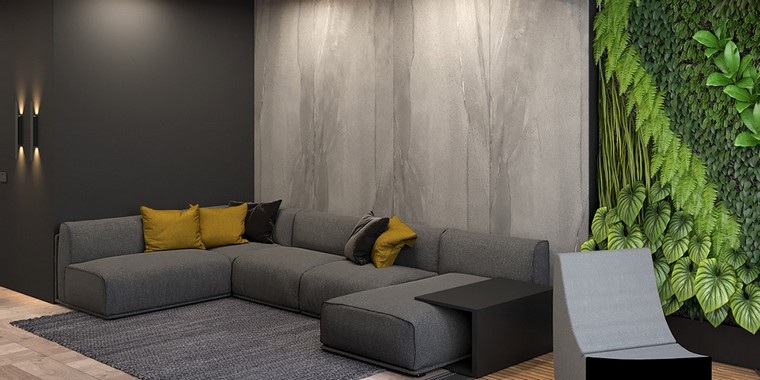 modernus interjeras pilka sofa geltona pagalvėlė idėja kilimo grindys vertikalus sodas