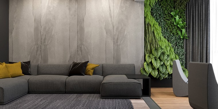 modernaus interjero vertikalaus sodo idėja pilka sofa geltonos pagalvėlės grindų kilimėlis