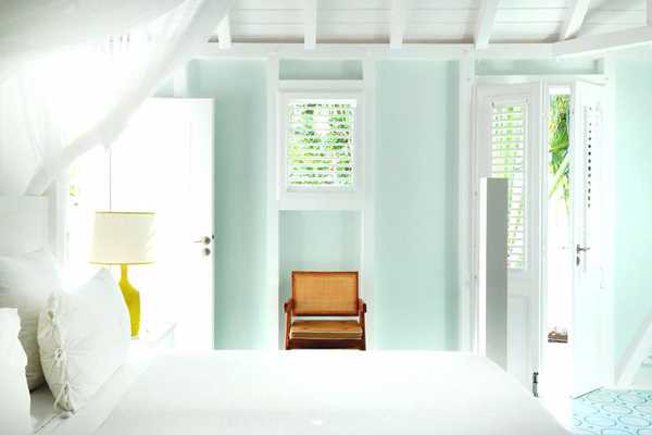 habitación de hotel con paredes azules o turquesas Islas del Caribe