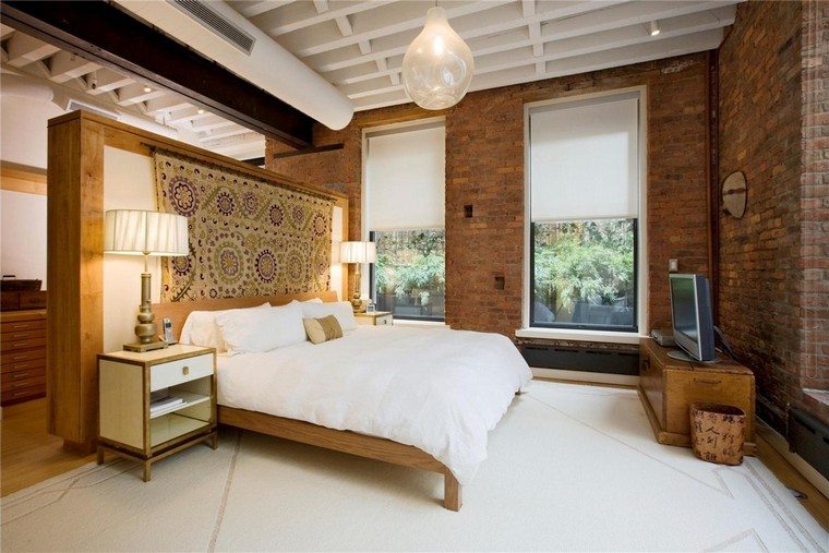 Idea di legno della testata del letto in mattoni della parete della camera da letto