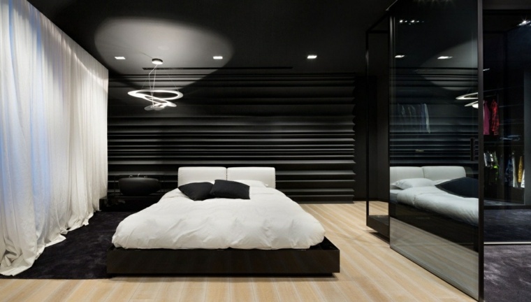 letto design camera da letto moderna idea parquet legno divano in pelle grigia