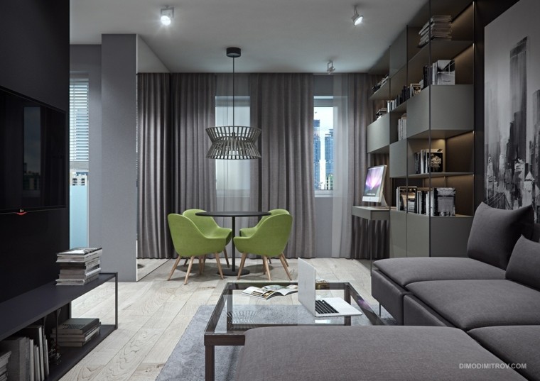 piccolo appartamento in stile industriale idea divano ad angolo grigio poltrona verde tavolo rotondo