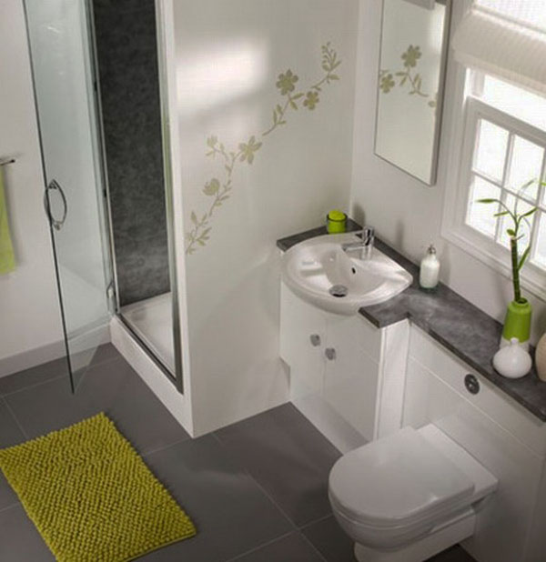 Mažas šiuolaikiškas balto ir žalio dizaino vonios kambarys