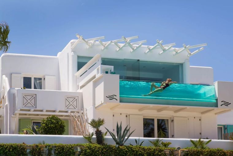 modern-design-swimming-pool-exterior-glass-wall.webp