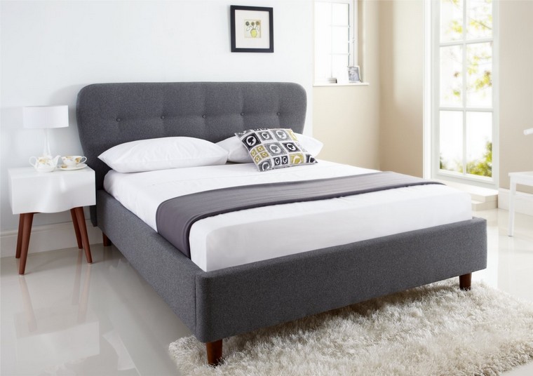 testata letto grigio idea camera da letto interni moquette pavimento tavolo parete trendy