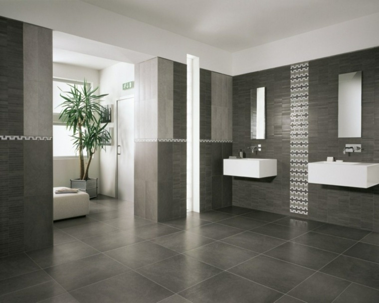 modernaus dizaino interjero idėja pilka vonios kambario plytelėmis išklota indų kriauklė vazoninis augalas