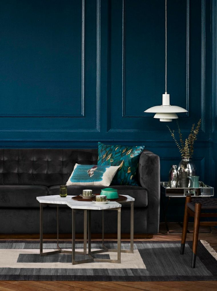 soggiorno moderno design divano in pelle bianca lampada a sospensione tappetino