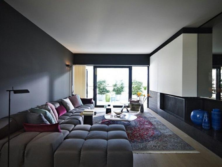 soggiorno design moderno divano ad angolo cuscini idea tappetino fiori
