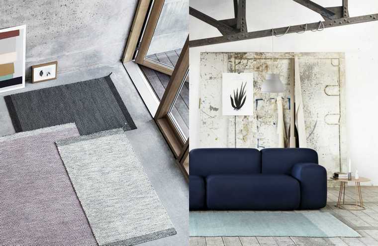 interior design deco soggiorno divano blu tappeto pavimento grigio idea