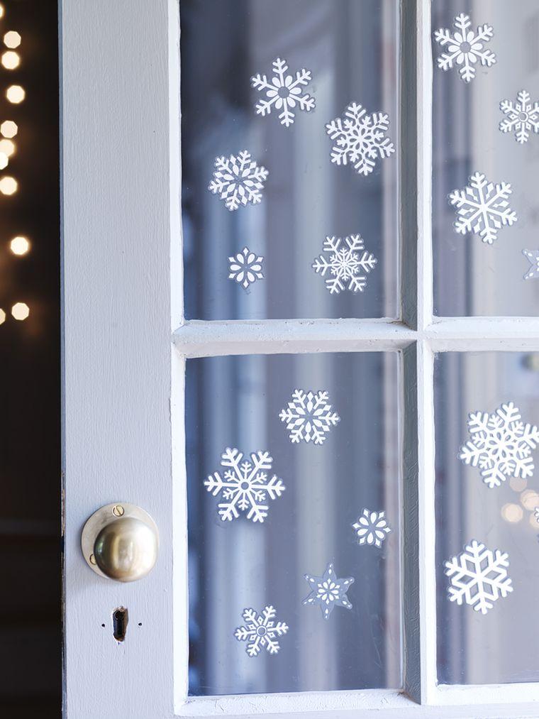 Idee per decorare la casa della porta d'ingresso degli adesivi per finestre di Natale