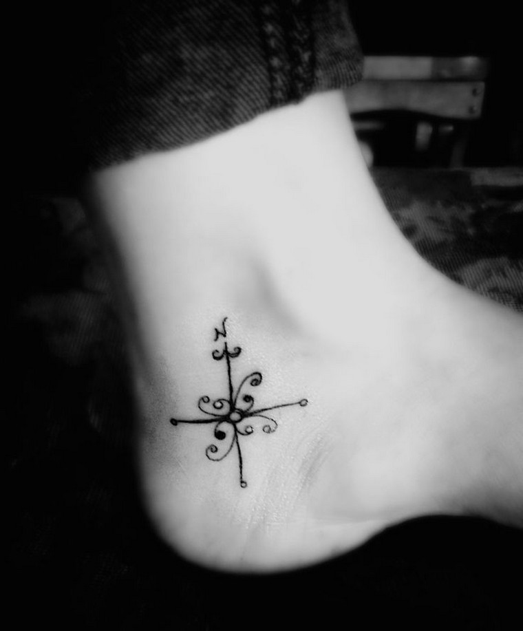 small-tattoo-woman-compass-tattoo-meaning-idea-model