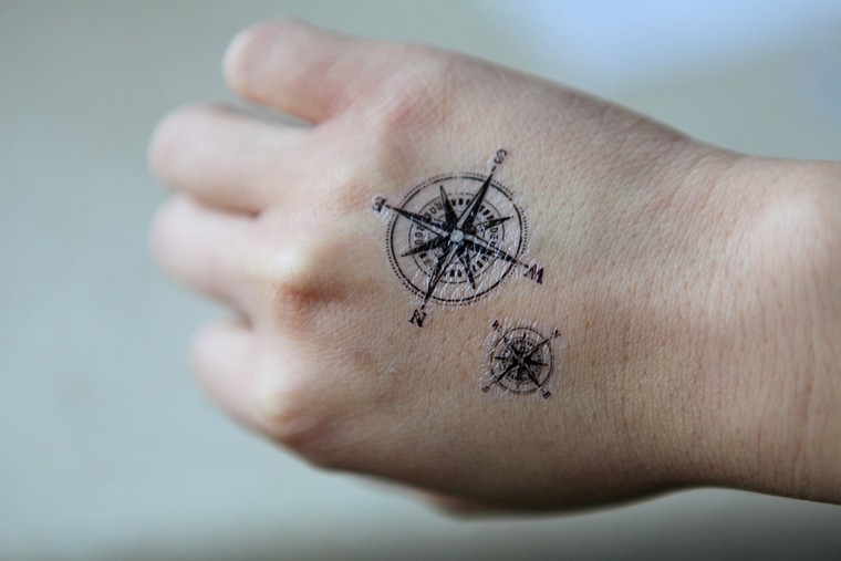 small-hand-tattoo-idea-compass-tattoo