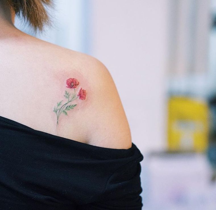 small-tattoo-woman-shoulder-poppy-meaning