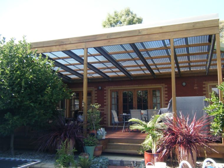coprire una terrazza in legno di vetro per trovare rifugio in ogni condizione atmosferica
