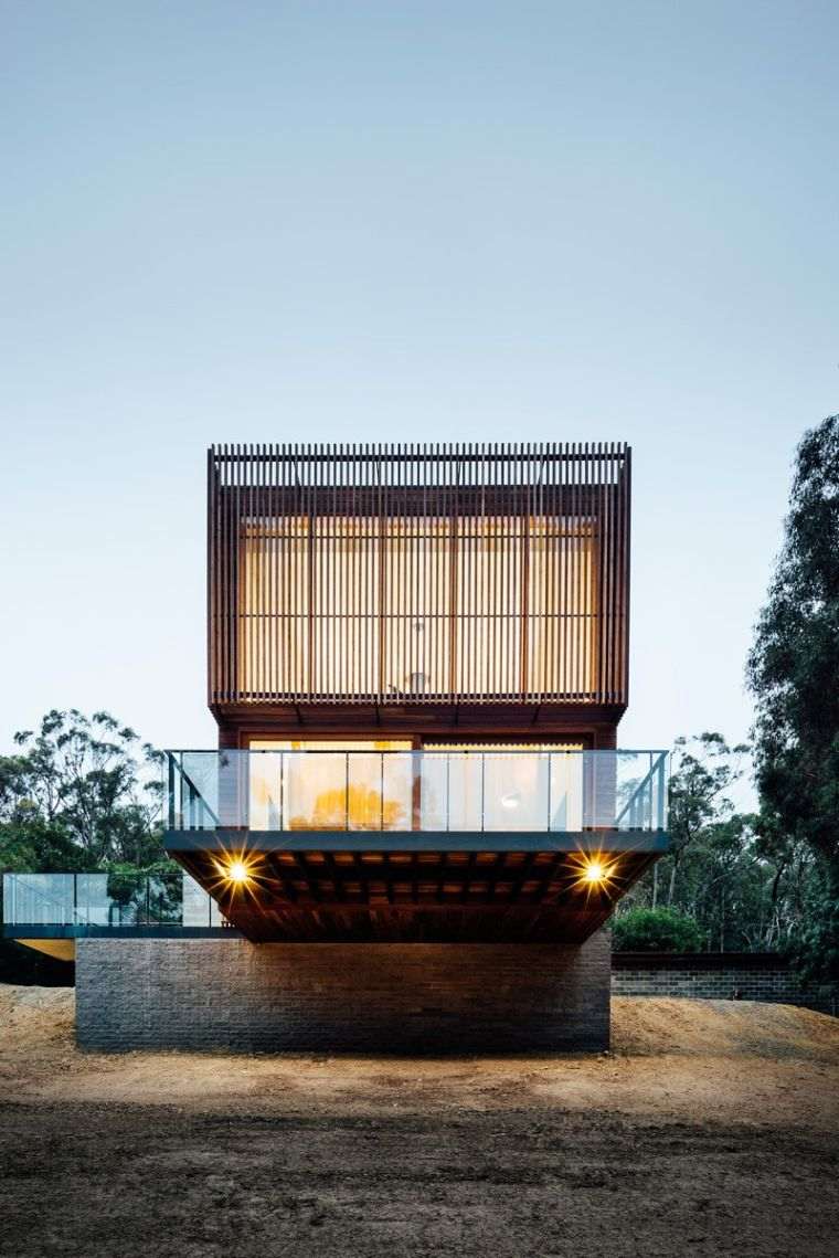 terrazza-cemento-facciata-vetro-casa-in-legno